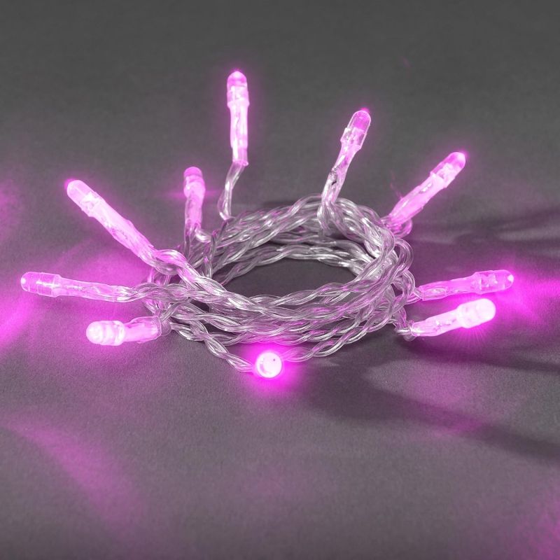 Konstsmide 1408-343 LED Lichterkette, 20 pinke Dioden, batteriebetrieben, transparentes Kabel, 2 x AA 1.5V (exkl.)